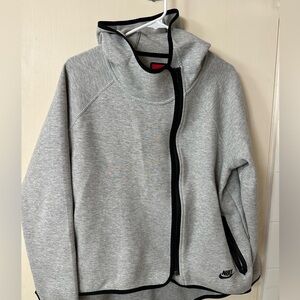 Nike zipper hoodie with asymmetrical back hemline. Womens L